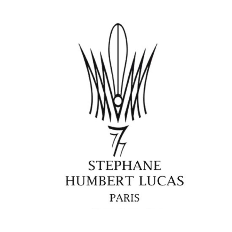 Logo for Stéphane Humbert Lucas, showcasing the brand's initials 'SHL' in an ornate, artistic script against a clear background.