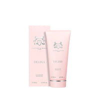 Two pink bottles of Delina shower gel by Parfums de Marly on a white background